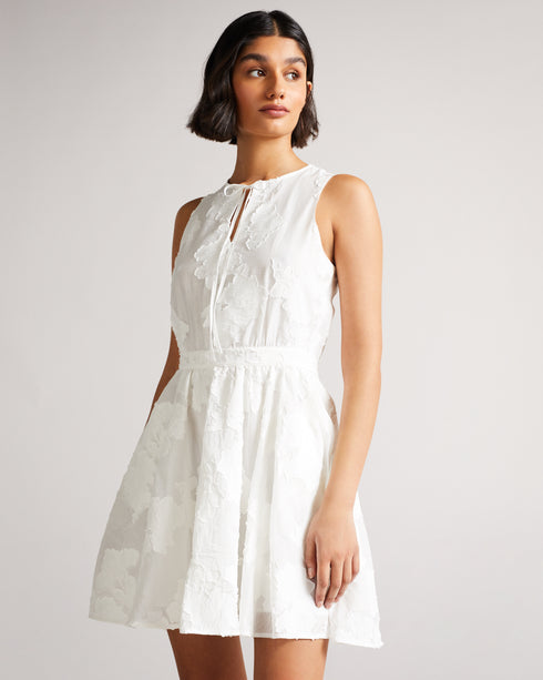 <P>Flippy Mini Dress With Neck Tie</P>